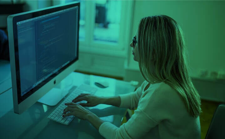 photo of a woman on the computer